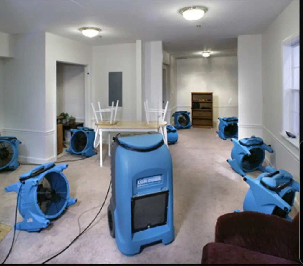 Air movers and dehumidifier setup for Water Damage Restoration in Kahaluu